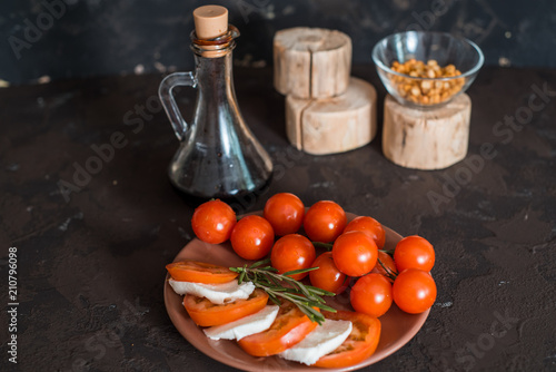 Mozzarella, cherry tomatoes and basil.Caprese salad photo