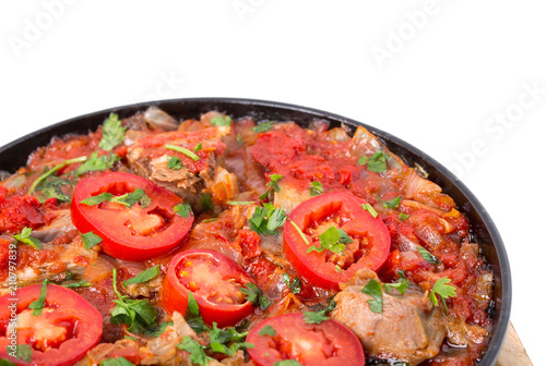 Stewed beef loin with tomatoes and onions.