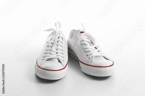 white sneakers on white