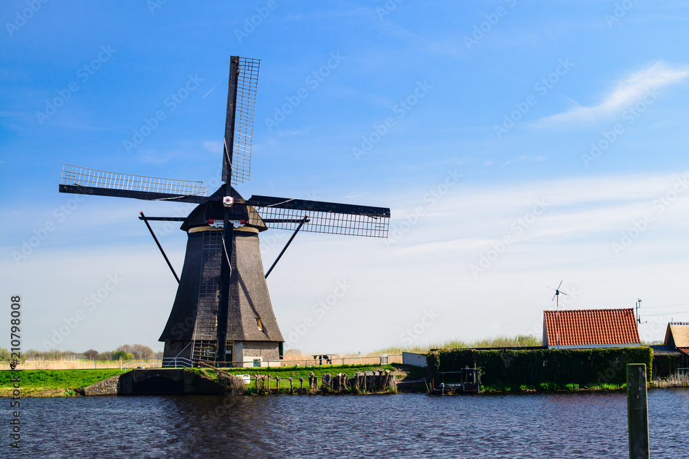 Colorful beautiful summer scene in the famous Kinderdijk canals 