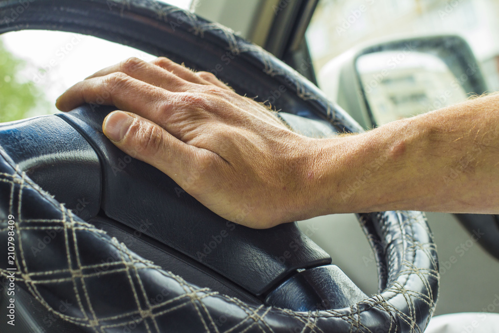 Male hand honking the car horn, man driving vehicle and beeping, front ...