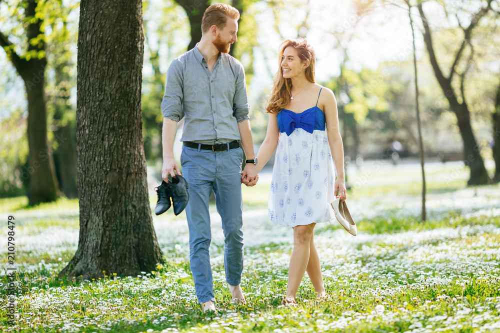 Fototapeta premium Romantic couple walking forest
