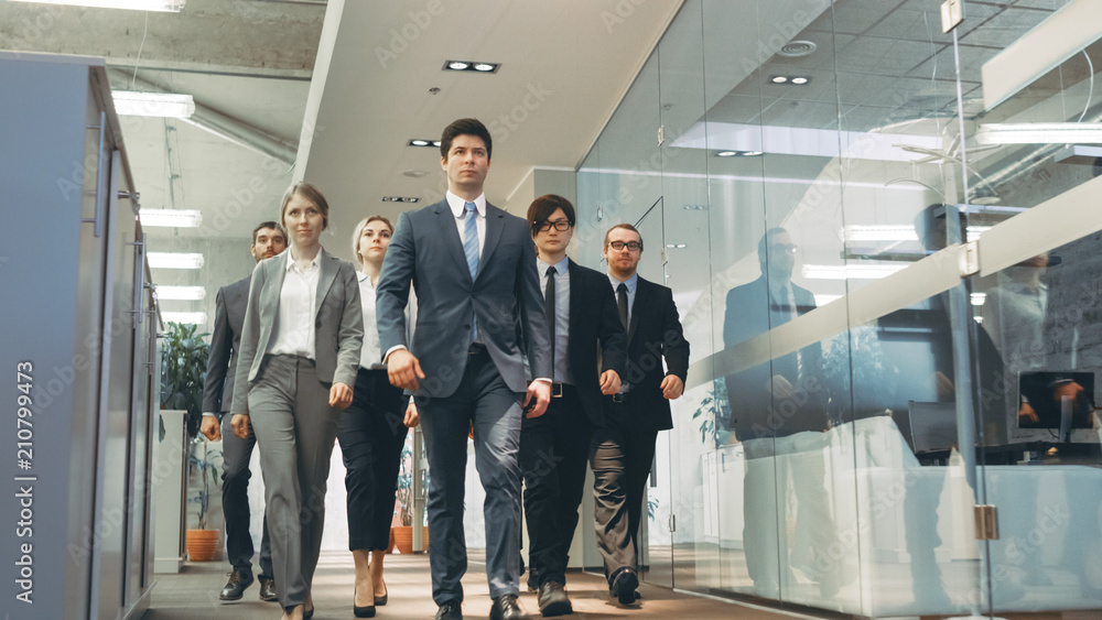 Diverse Team of Delegates/ Lawyers Confidently Marching Through the