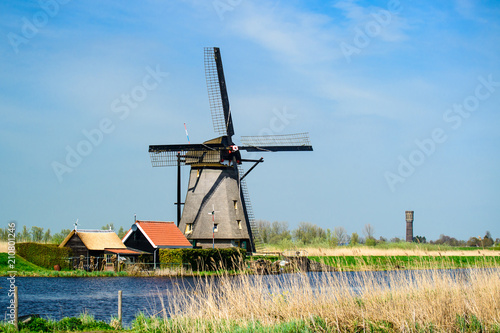 Colorful beautiful summer scene in the famous Kinderdijk canals 