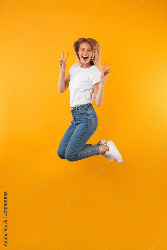 Full length portrait of a cheerful young blonde girl Full length portrait of a cheerful young blonde girl