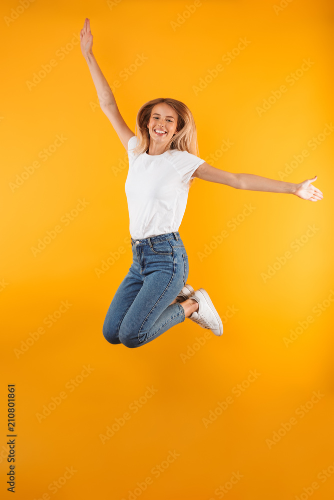 Full length portrait of a cheerful young blonde girl Full length portrait of a cheerful young blonde girl