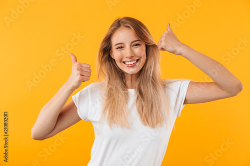 Obraz na plátne Portrait of a cheerful young blonde girl