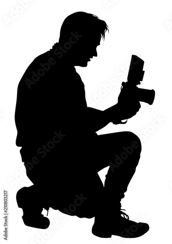 Man with a camera on white background