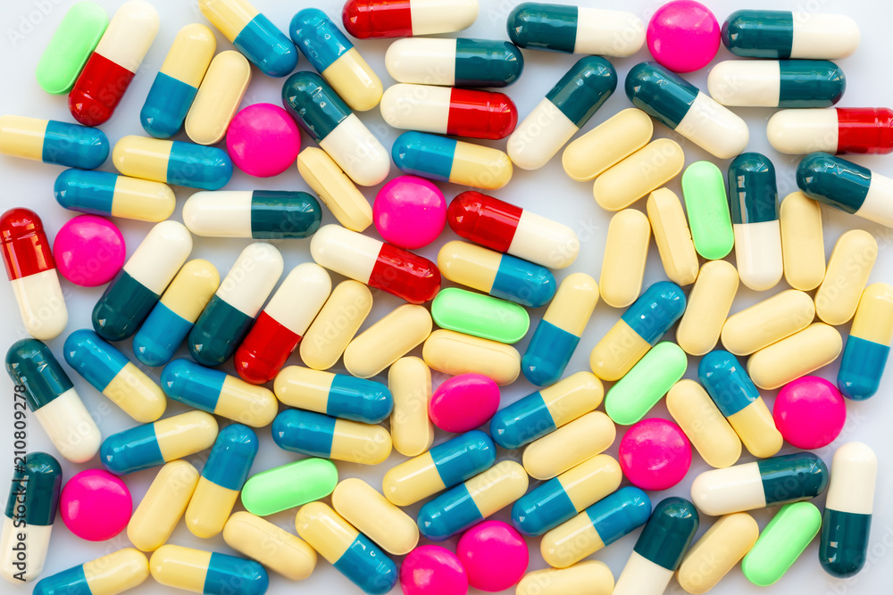 Background of colorful pills and medication, health and medication concept