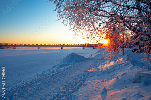 Winter in Lapland, Kemijoki River in Rovaniemi, Finland photo