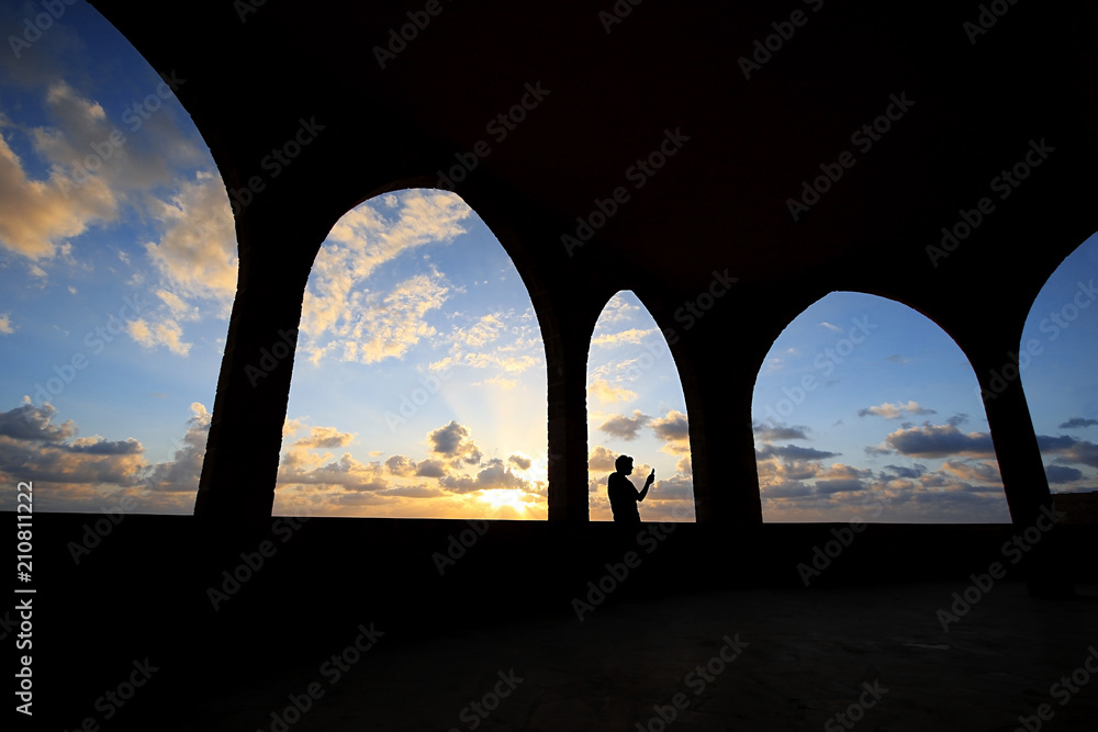 Silhouette of Man Taking Selfie