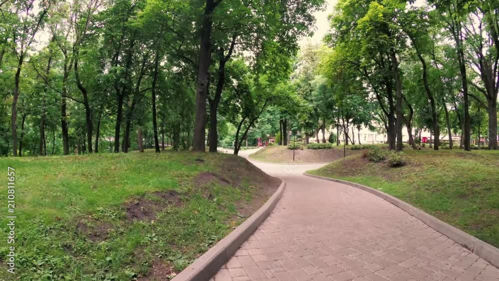 GOMEL, BELARUS. a footpath in a green park. GOMEL, BELARUS. a footpath in a green park.