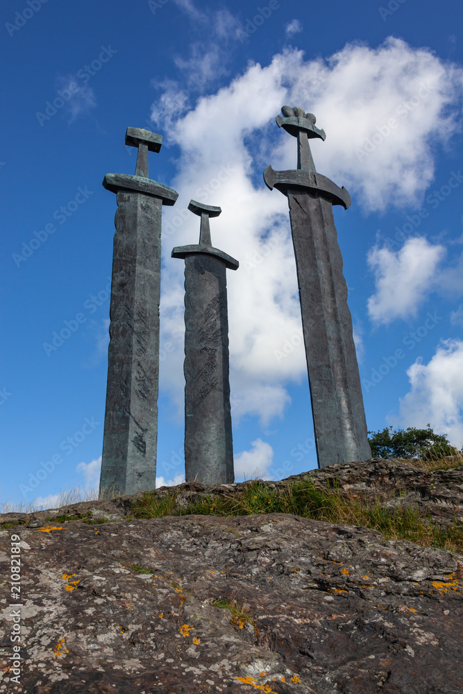 Three large viking swords stand on the hill as a memory to the Battle of Hafrsfjord in year 872 in Stavanger. Symbol of Stavanger, Norway.