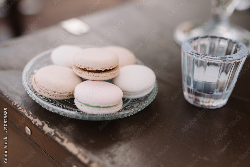 Sweet products at a wedding. Tasty cookies and cakes on glasswares Sweet products at a wedding. Tasty cookies and cakes on glasswares