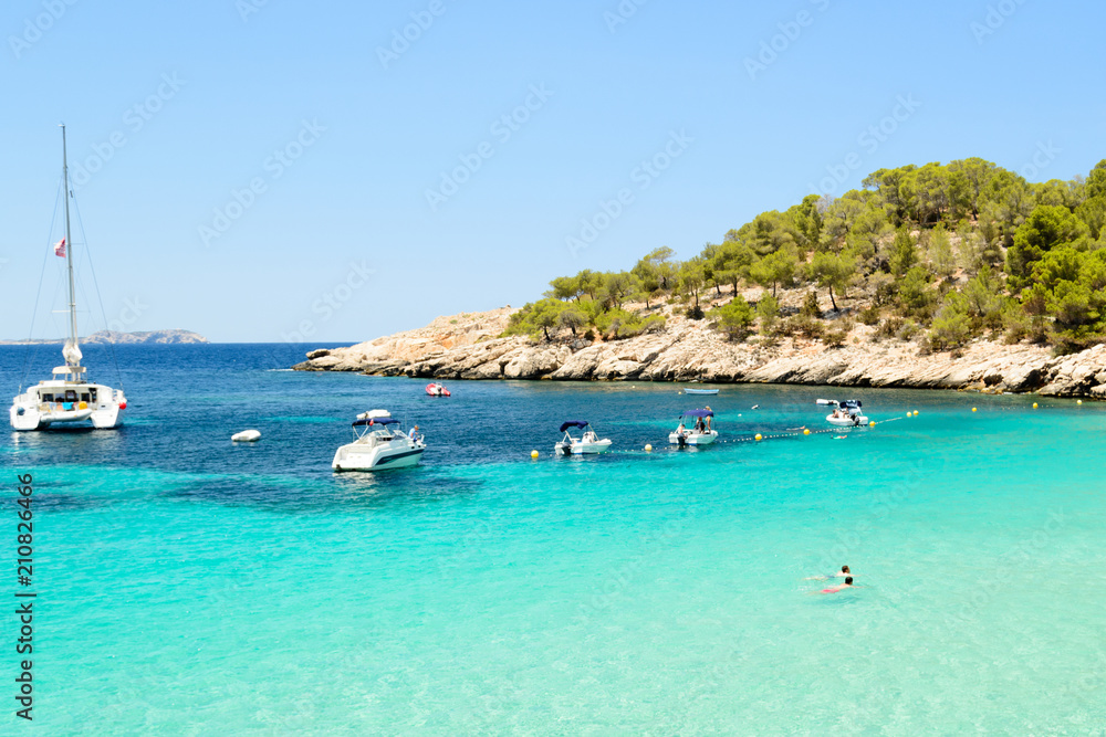 beach afternoon in Cala Salada, Sant Antoni de Portmany Ibiza, Spain - obrazy, fototapety, plakaty 