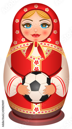 Russian nesting doll Matryoshka holds soccer ball