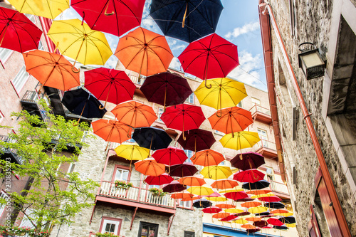 Lot of Umbrellas in Petit Champlain street Quebec city, Canada photo