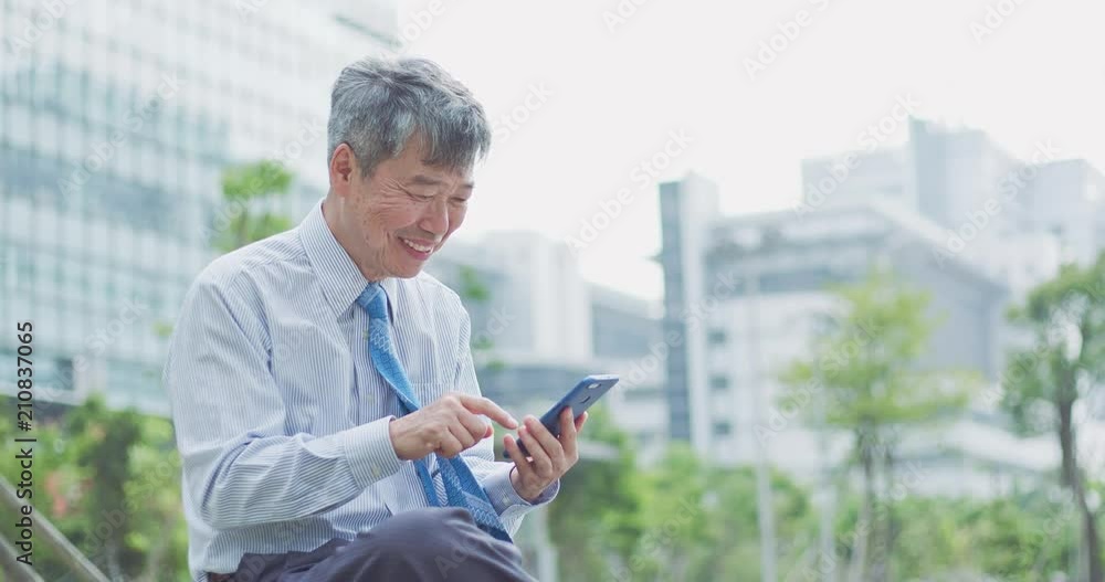 old businessman use phone old businessman use phone