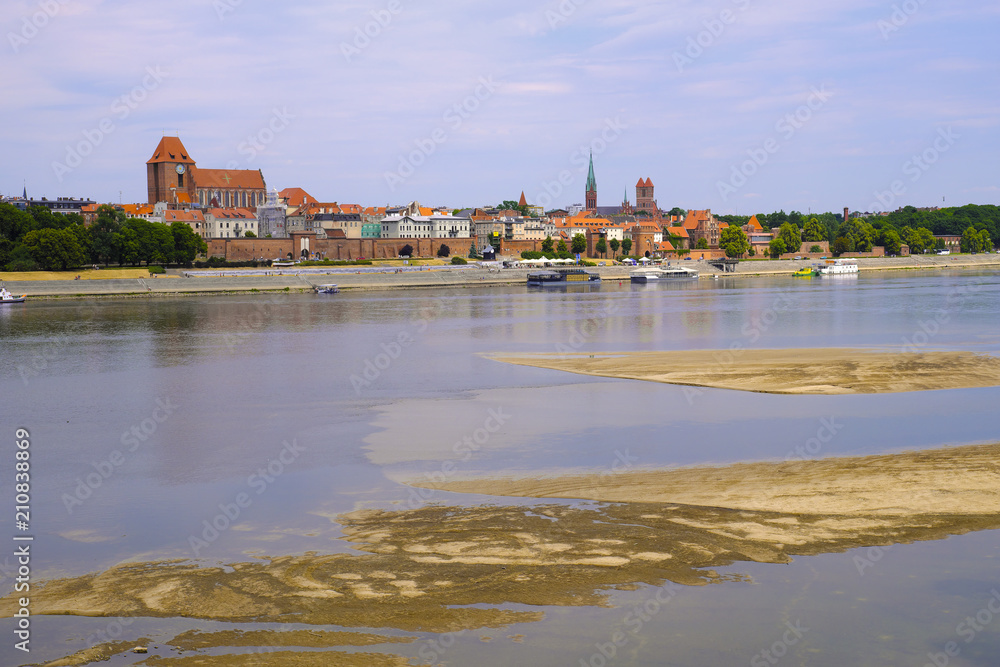 Fototapeta premium Torun, Poland - Panoramic view of historical district of Torun old town by the Vistula river