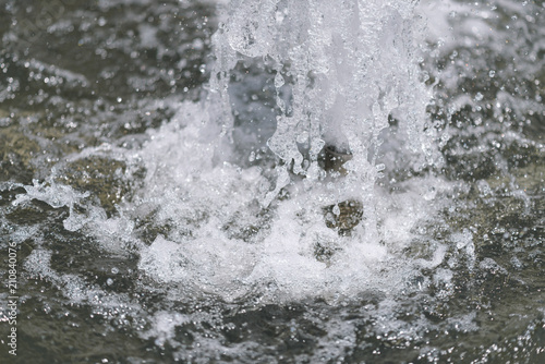 City fountain. Selective focus on water drops. © Vladimir Arndt