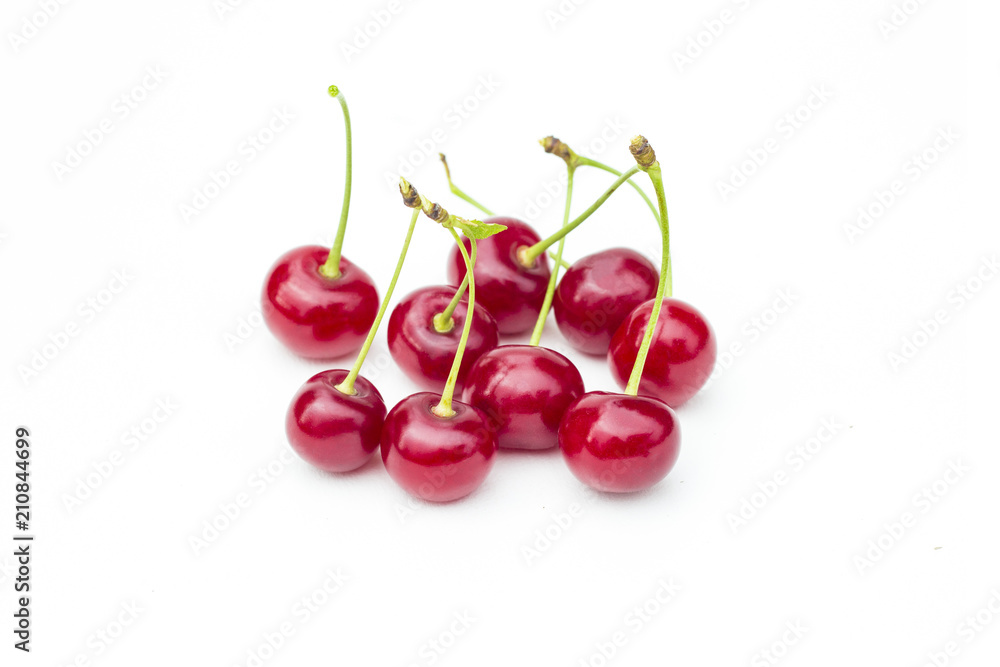 Fresh sweet cherries fruit, juicy ripe red cherry, berry, isolated on the white background Fresh sweet cherries fruit, juicy ripe red cherry, berry, isolated on the white background