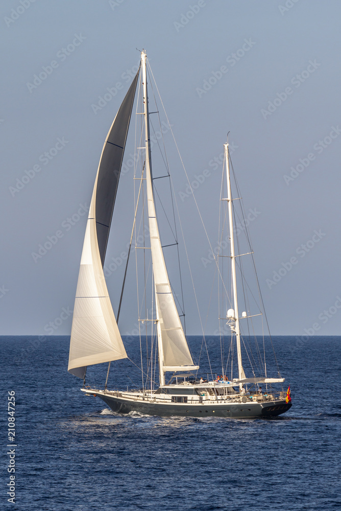 Sailboat sailing in the evening