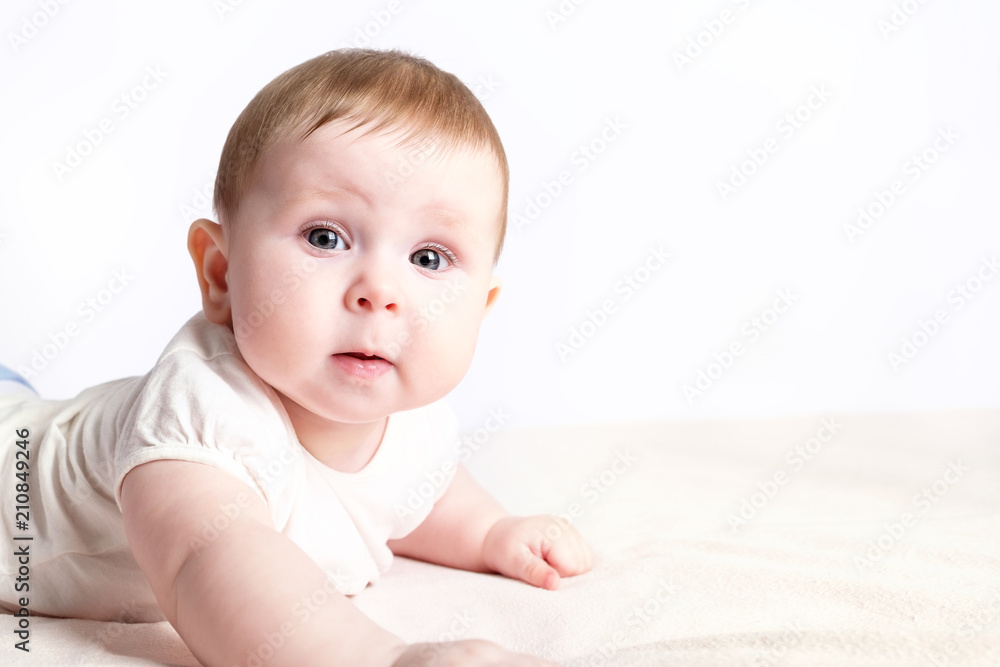 baby lying on his stomach