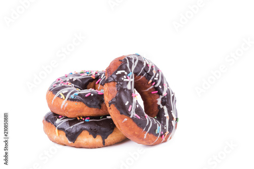 Donut with sprinkles isolated on white. Chocolate donut 
