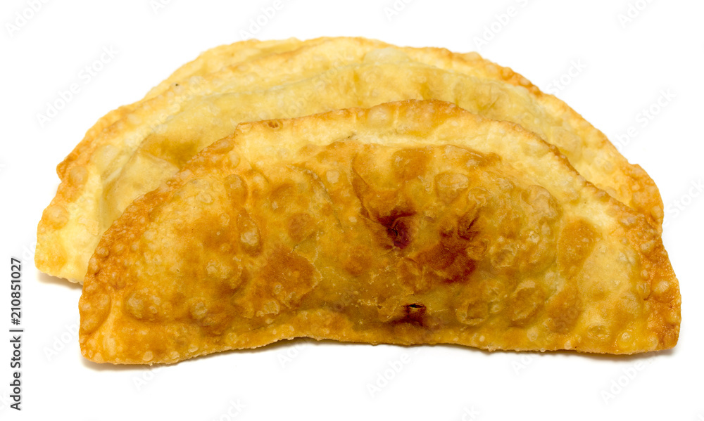 Cheburek - traditional dish of many Turkic and Mongolian peoples, isolated on white background Cheburek - traditional dish of many Turkic and Mongolian peoples, isolated on white background