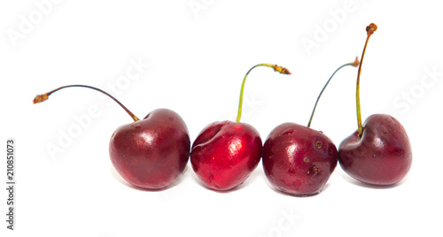 berries of a sweet cherry on a white background