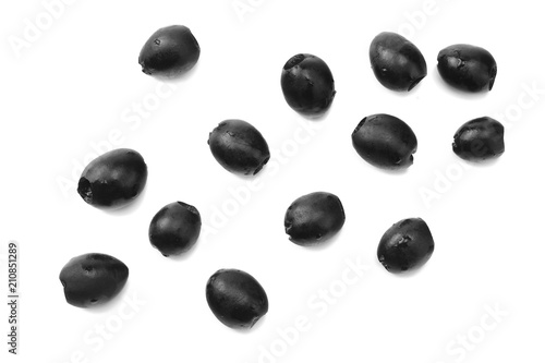 Marinated black olives isolated on white background. top view