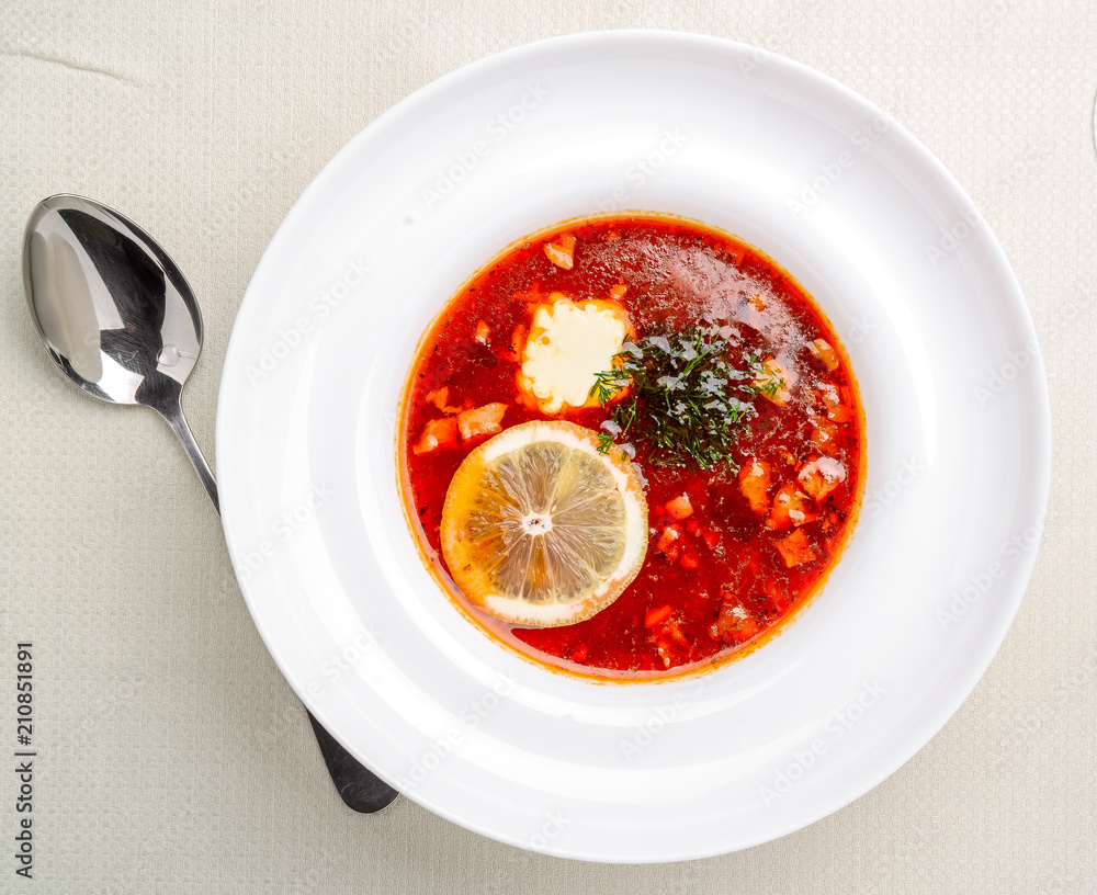 Traditional Russian soup solyanka closeup in a bowl Traditional Russian soup solyanka closeup in a bowl