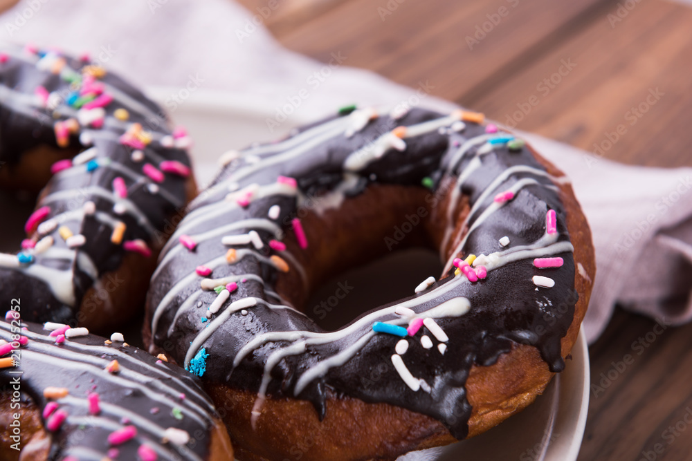 Donuts with Chocolate Icing and Sprinkles