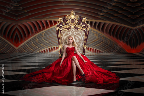 Blonde woman sitting on the throne photo