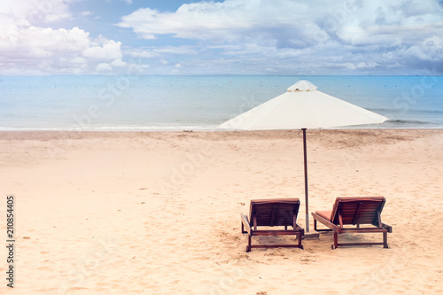 Chairs on the sandy beach near the sea. Summer holiday and vacation concept for tourism. Inspirational tropical landscape