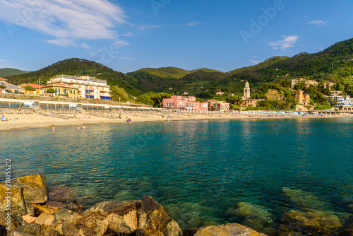 Levanto - town in Liguria, close to Cinque Terre in Italy. Scenic Mediterranean riviera coast. Historical Old Town with colorful houses and sand beach at beautiful coast of Italy. photo