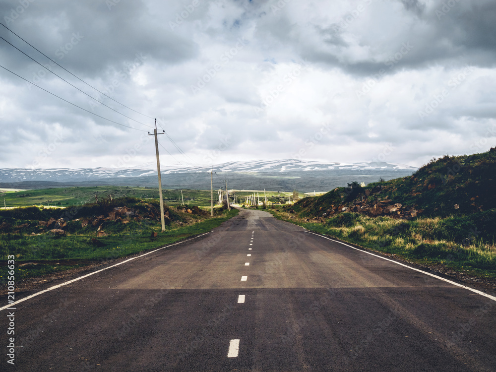 Fototapeta premium scenic shot of empty road with mountains on background, Armenia