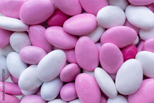 background of pink and white candy. sweets closeup. top view