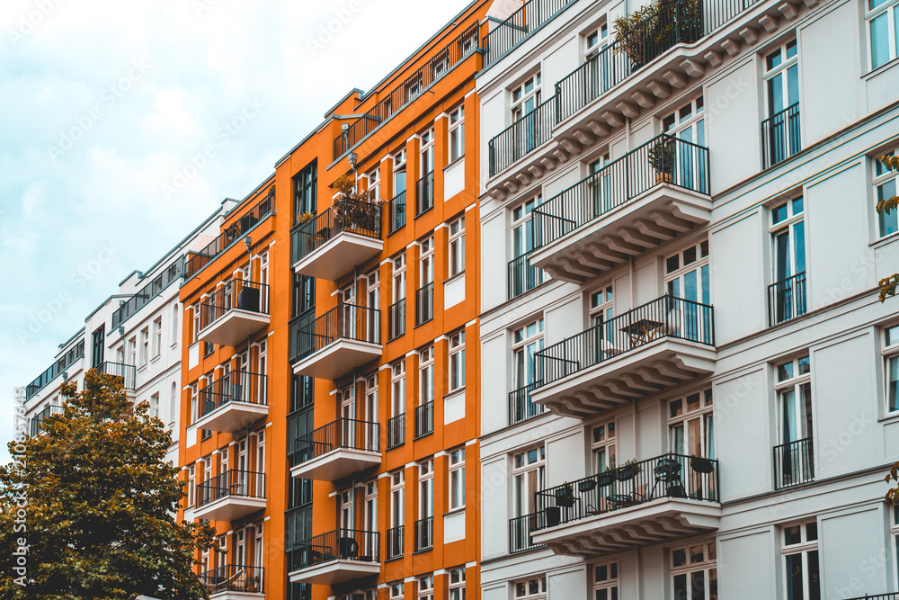 orange and white apartment or row houses at berlin