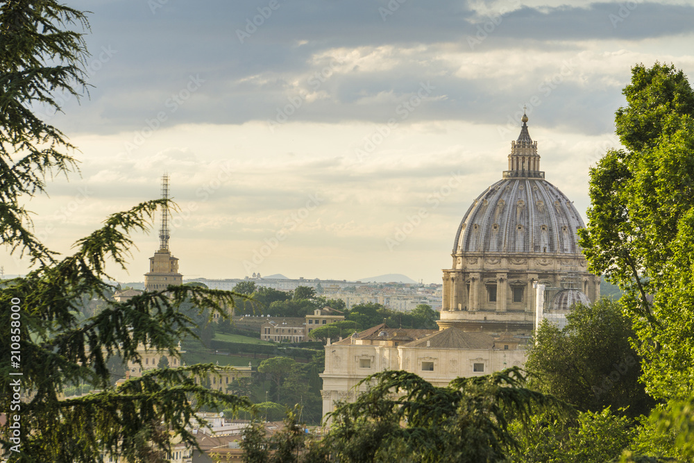 View of St Peter's basilica dome in Rome, Italy