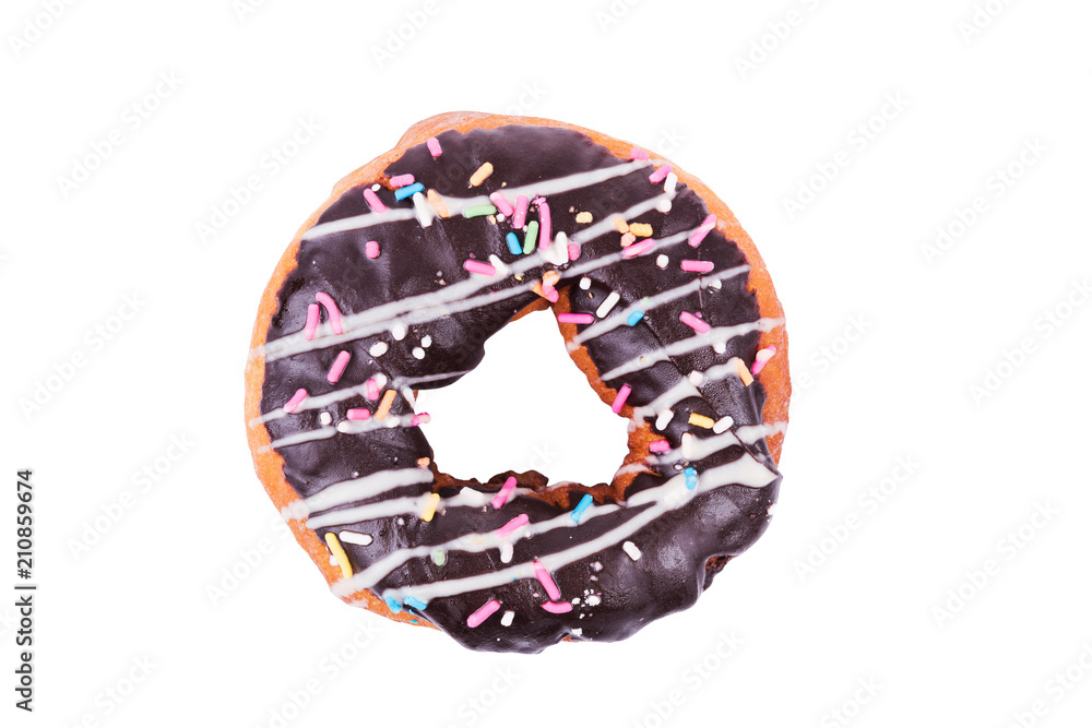 Fototapeta premium Chocolate donut with sprinkles on white background.