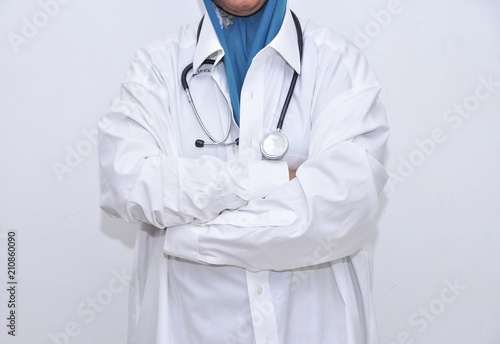 Female Doctor with a stethoscope isolated on white background.