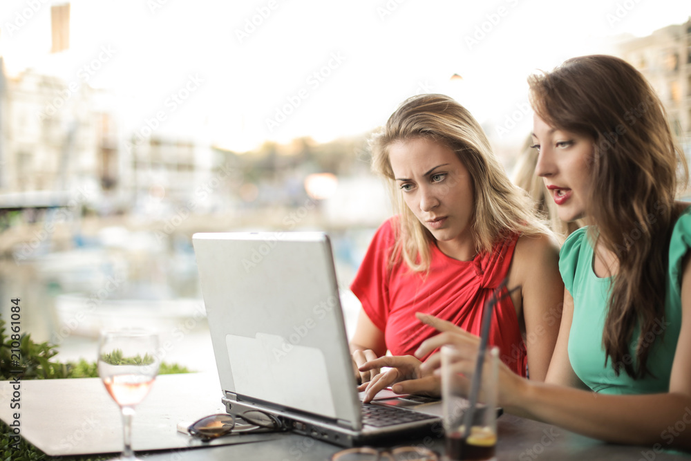 Girls using a laptop Girls using a laptop