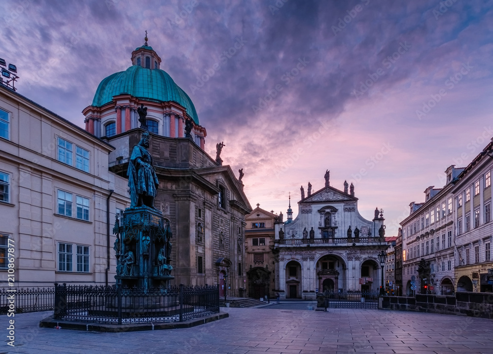 Krizovnicke square at the morning. Golden hour in Prague with city gas lamps and Charles IV statue, Czech Republic