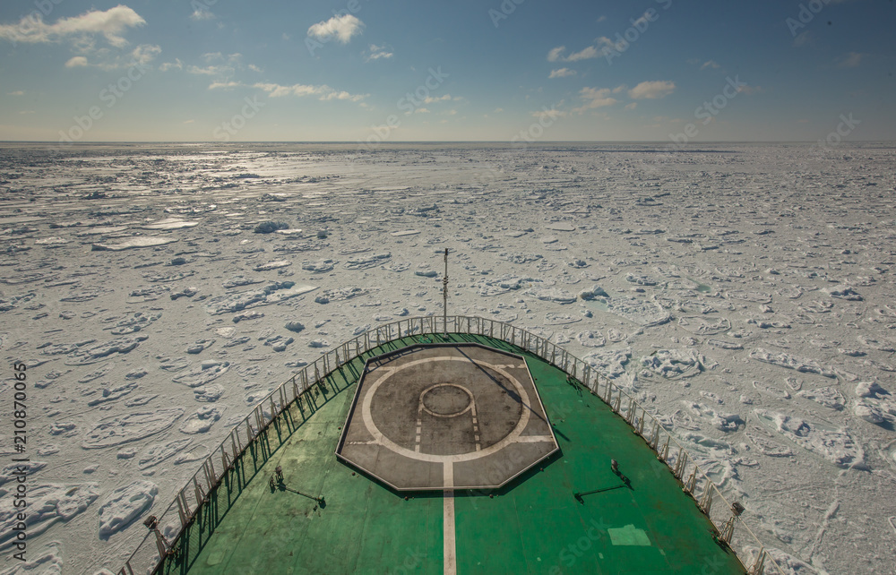 A view of the icy field of the Kara Sea from the nose of a Russian military icebreaker. Arctic cruises