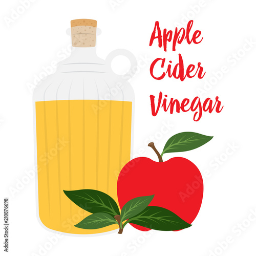 Apple cider vinegar in glass bottle with apple fruit