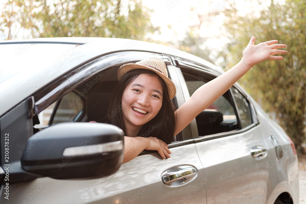 Happy woman hand relaxing and enjoying road trip. Happy woman hand relaxing and enjoying road trip.
