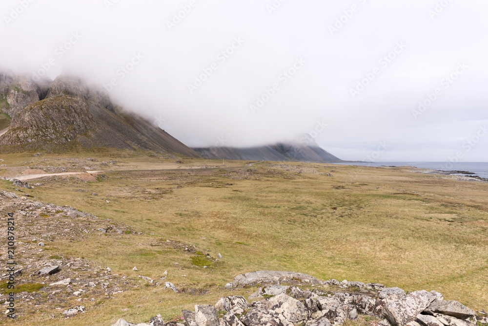 Icelandic mountain landscape in the fog in springtime Icelandic mountain landscape in the fog in springtime