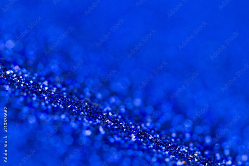 Blue glitter texture close up macro. Abstract sparkle background. Blue glitter texture close up macro. Abstract sparkle background.