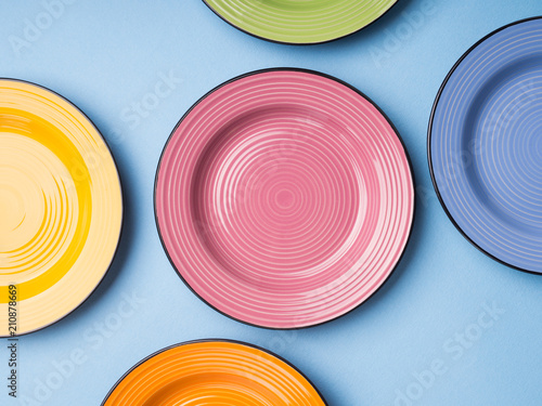 Colorful ceramic dishes. Flat lay tableware set concept
